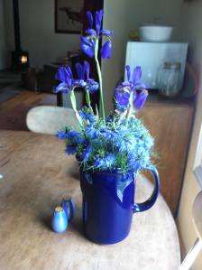 a table full of blue - love in the mist and iris